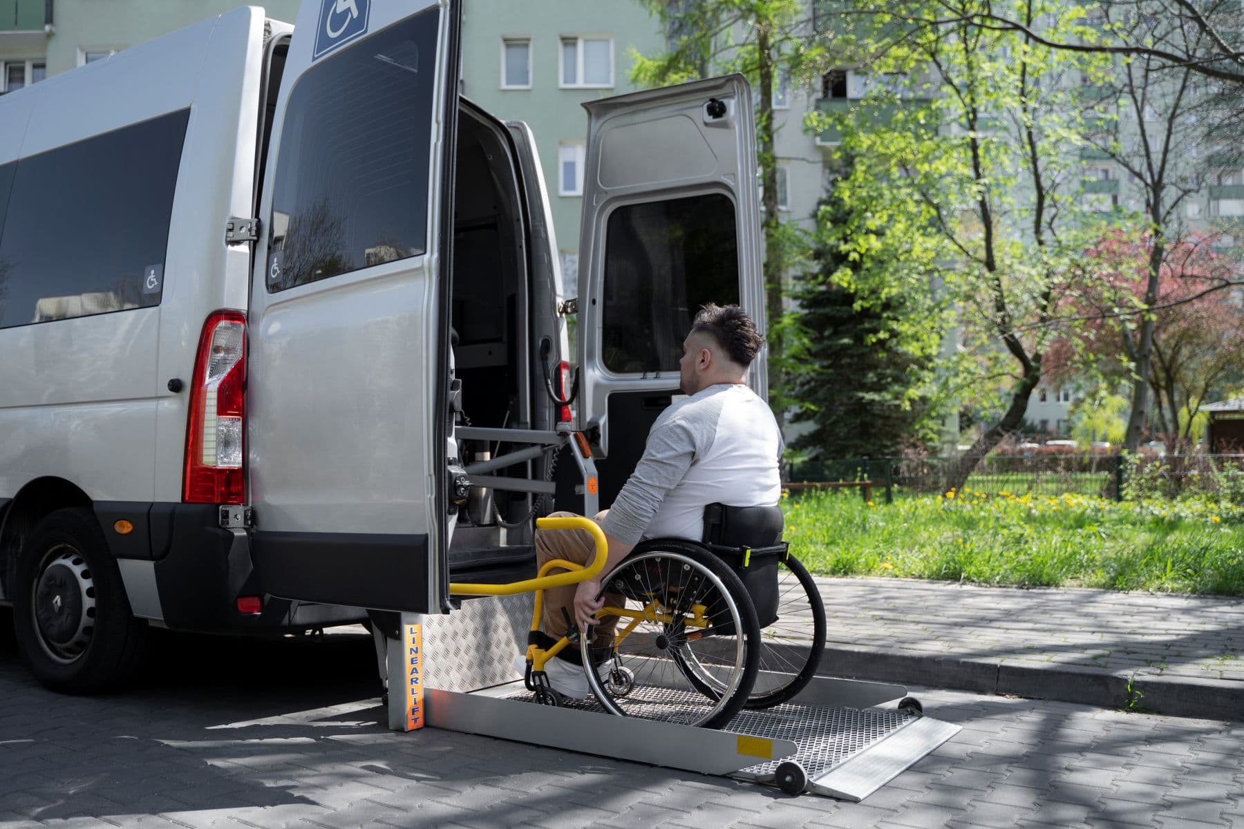 Passenger using wheelchair-accessible transportation